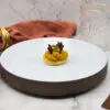 Amuse met tikka masala mousse en tandoori kippenhuid