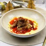 Secreto Iberico met beurre blanc en 'nduja boter