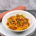 Spaghetti met kip in zongedroogde tomaten roomsaus