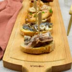 Pintxos met gebakken paddenstoelen en lardo