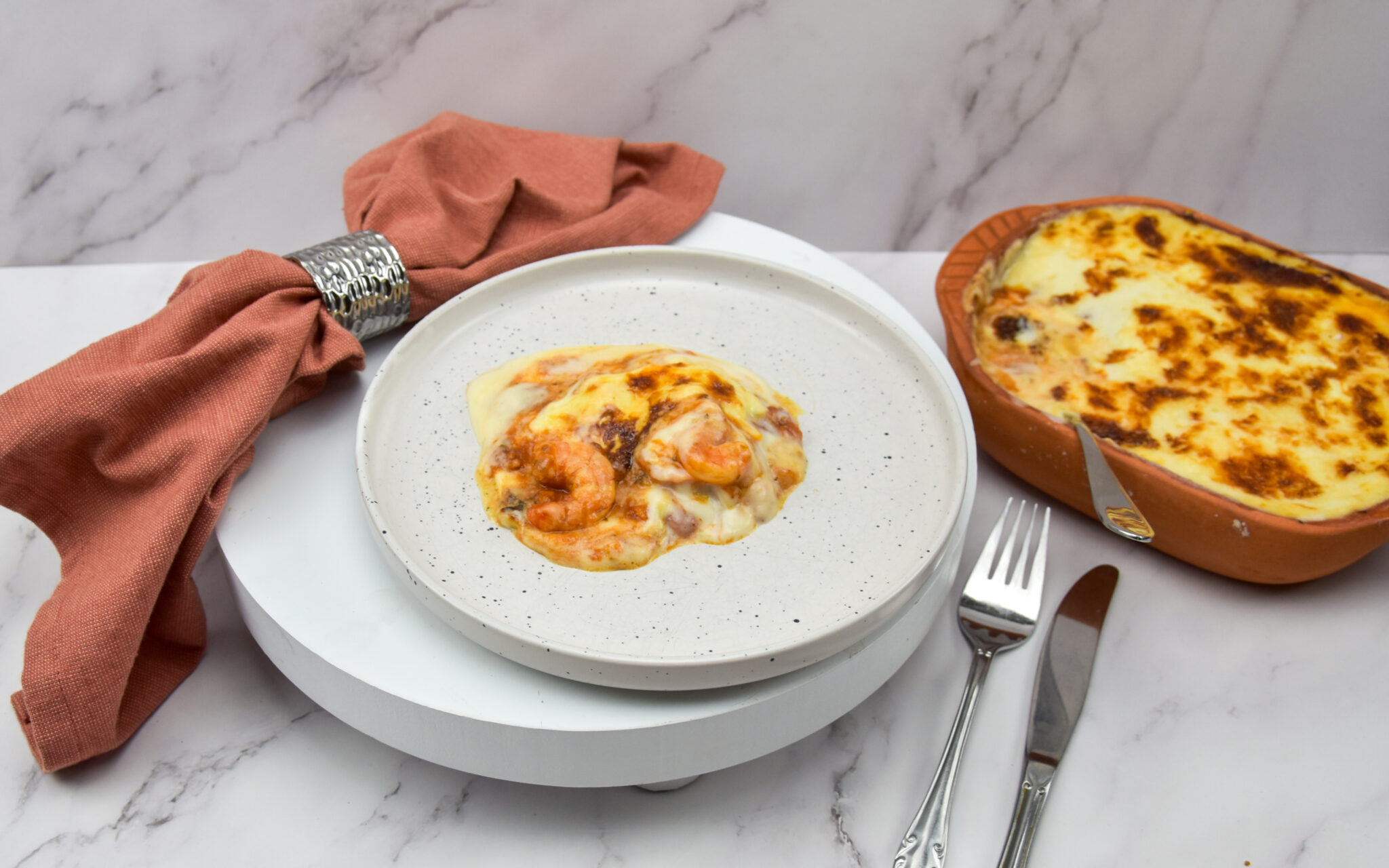 Gamba's in tomatensaus met bechamel uit de oven