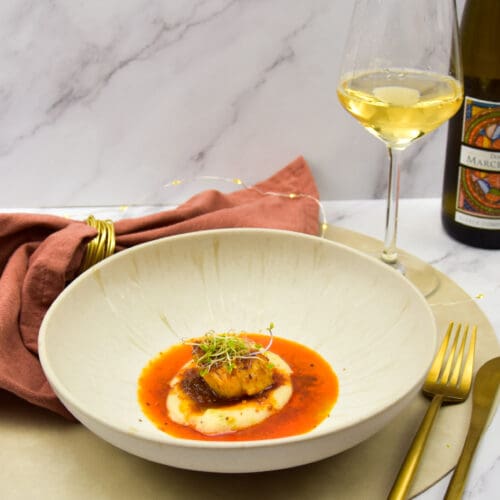Coquilles met polenta, 'nduja boter en peterselie olie