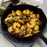 Gamba's al ajillo met crispy chili oil en schelpjes