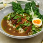 Brothy rice met krokante eend