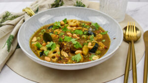 Varkenswangen in groene currysaus