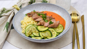 Fregola met romescosaus en iberico secreto
