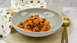 Pasta met romescosaus en Portugees spek
