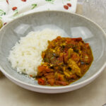 Tomatencurry met makreel